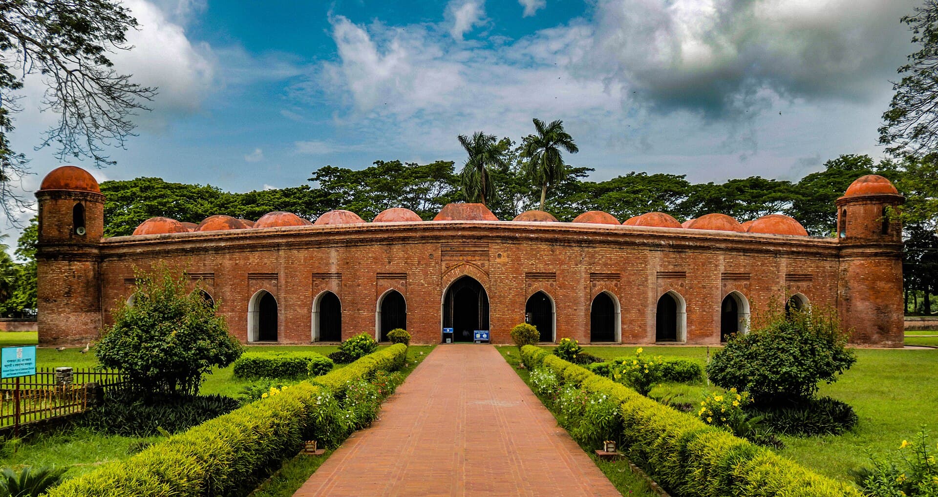 Brick façade and domes of the Sixty Dome Mosque at Bagerhat