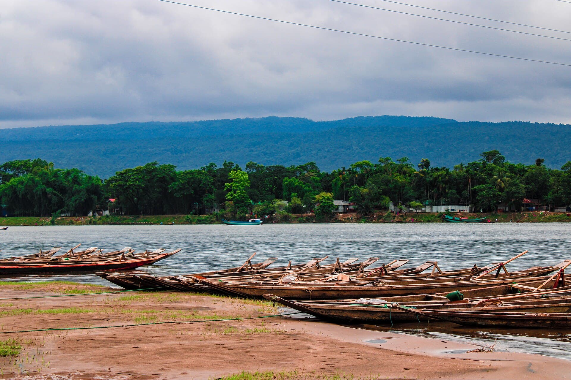 Clear Piyain River and boulders at Jaflong, Sylhet, with the Khasi hills behind